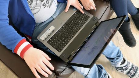 Orbis Group - Ty Seren using a laptop computer